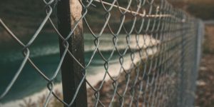 Outdoor Fence with Greenery in Background
